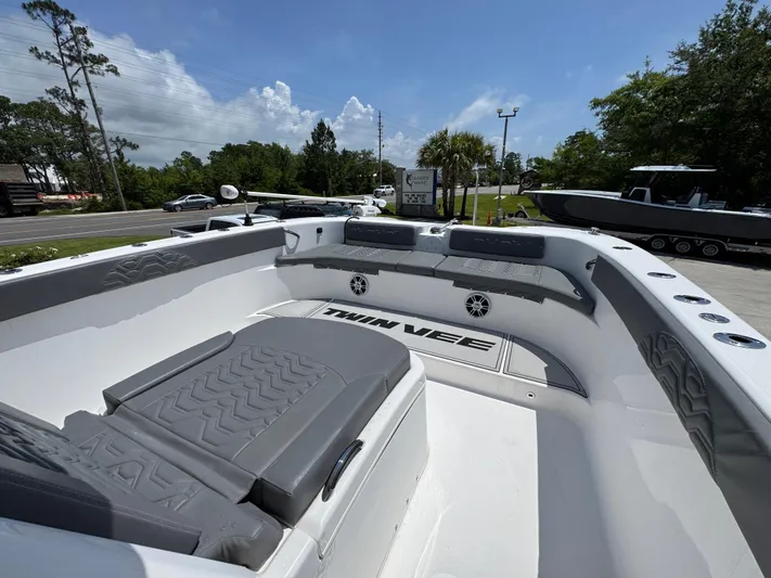  Yacht Photos Pics 2022 Twin Vee 340 GFX CC boat interior with gray seating and open deck.