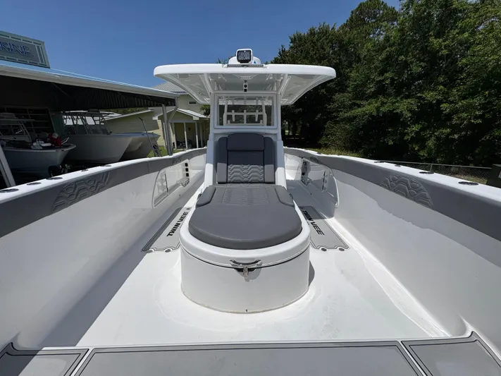  Yacht Photos Pics 2022 Twin Vee 340 GFX CC boat with spacious seating and sleek design.