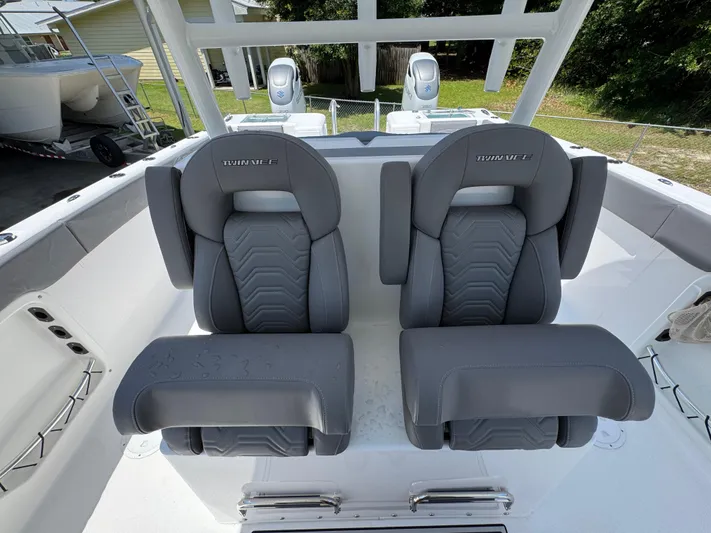  Yacht Photos Pics 2022 Twin Vee 340 GFX CC boat seats, featuring sleek gray design and modern comfort.