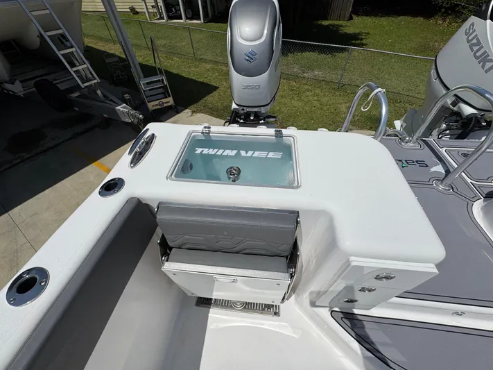  Yacht Photos Pics 2022 Twin Vee 340 GFX CC boat with Suzuki engine, featuring a sleek control panel.