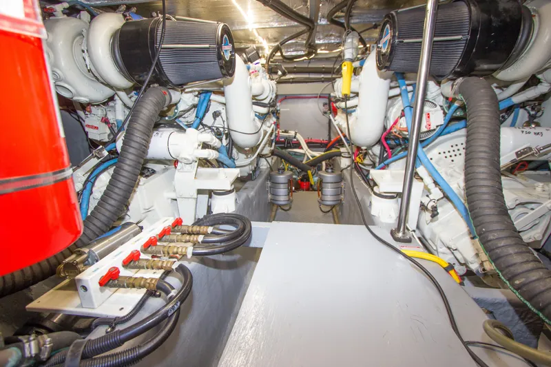 Eclipse Yacht Photos Pics Engine room of 1998 Sea Ray 480 Sedan Bridge, showcasing mechanical components and wiring.