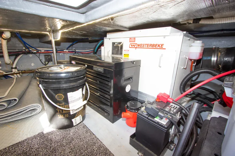 Eclipse Yacht Photos Pics Engine room of 1998 Sea Ray 480 Sedan Bridge with Westerbeke generator and tools.