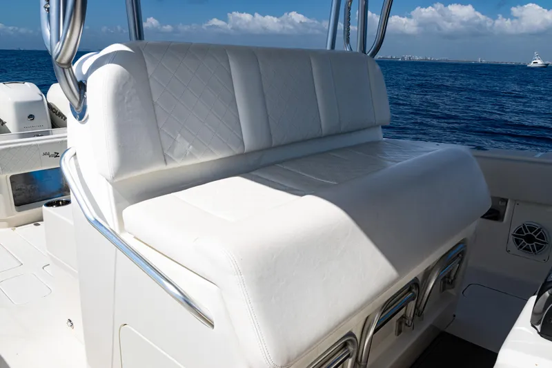  Yacht Photos Pics 2019 SeaVee 390Z boat with white cushioned seating, ocean view in background.