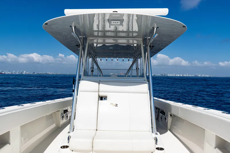  Yacht Photos Pics 2019 SeaVee 390Z boat on open ocean with clear blue sky.
