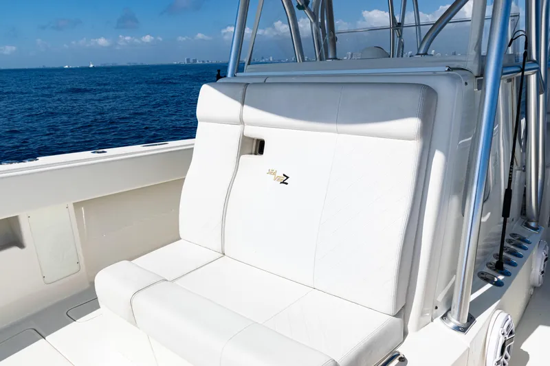  Yacht Photos Pics 2019 SeaVee 390Z boat with white seating, ocean backdrop, and clear skies.
