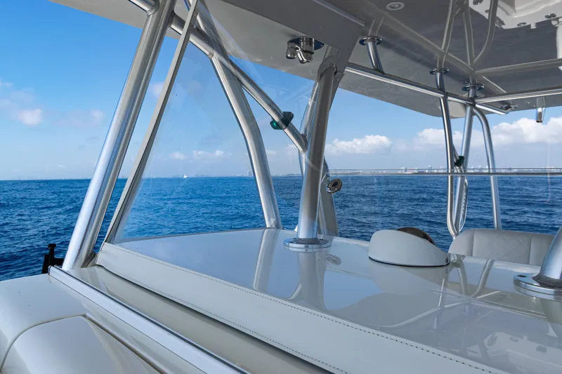  Yacht Photos Pics 2019 SeaVee 390Z boat interior with ocean view, showcasing sleek design and clear skies.