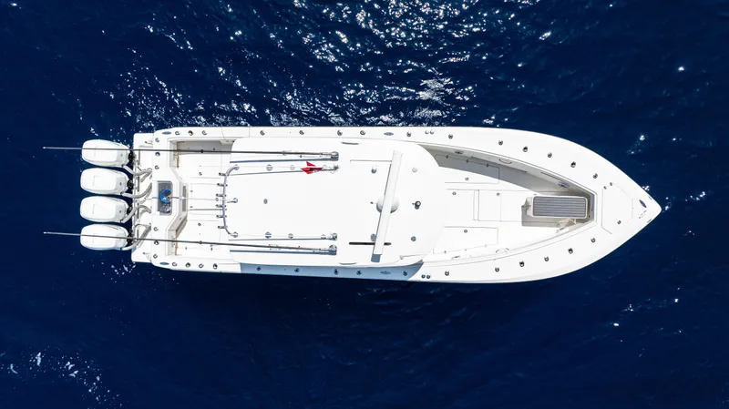  Yacht Photos Pics Aerial view of 2019 SeaVee 390Z boat on deep blue ocean.