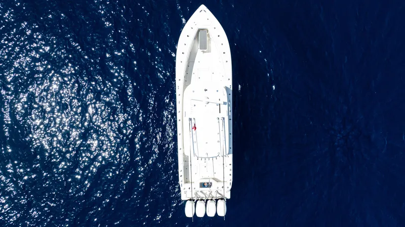  Yacht Photos Pics Aerial view of 2019 SeaVee 390Z boat on deep blue ocean water.
