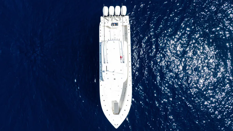  Yacht Photos Pics Aerial view of 2019 SeaVee 390Z boat on deep blue ocean water.