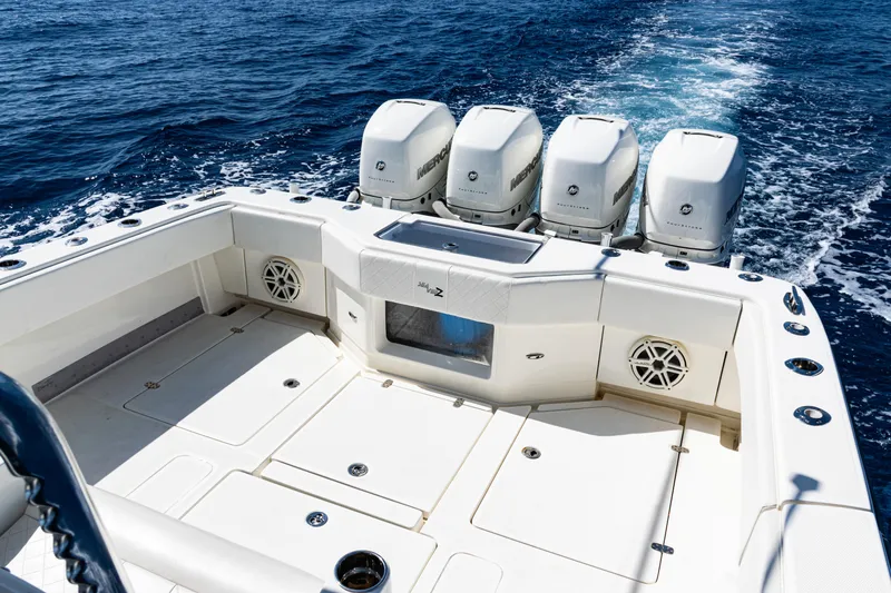  Yacht Photos Pics 2019 SeaVee 390Z boat with four powerful outboard engines on open ocean.