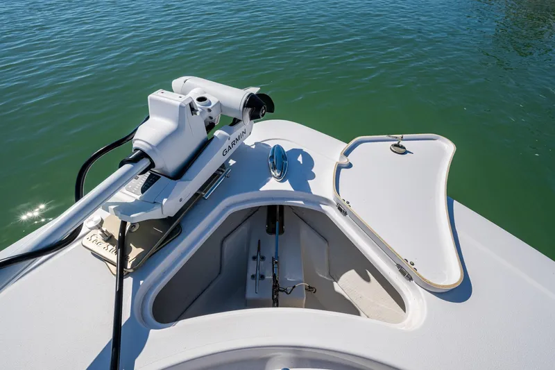  Yacht Photos Pics 2023 Sportsman Open 302 Center Console bow with Garmin equipment on calm water.