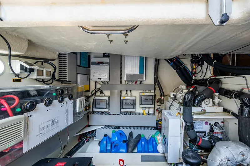 Blue B Yacht Photos Pics Engine room of 2015 Beneteau MONTE CARLO yacht, showcasing electrical systems and components.