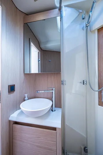 Blue B Yacht Photos Pics 2015 Beneteau Monte Carlo bathroom with modern sink and shower.