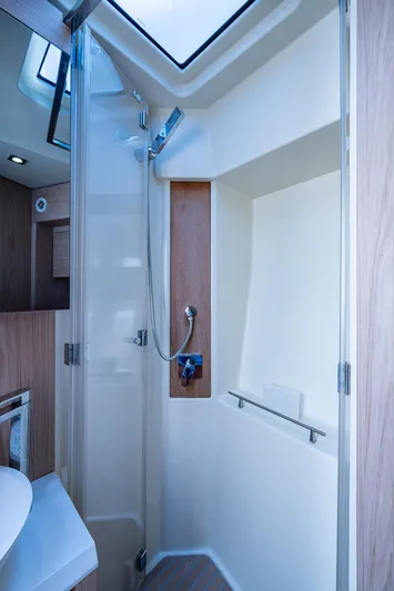 Blue B Yacht Photos Pics 2015 Beneteau MONTE CARLO yacht shower with modern fixtures and skylight.