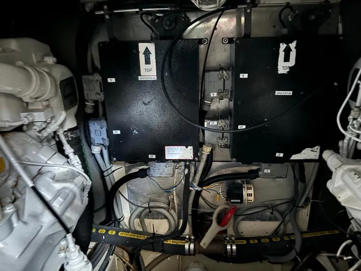  Yacht Photos Pics Engine room of 1998 Cantieri di Sarnico MAXIM 55 SPECIAL yacht, showing mechanical components.