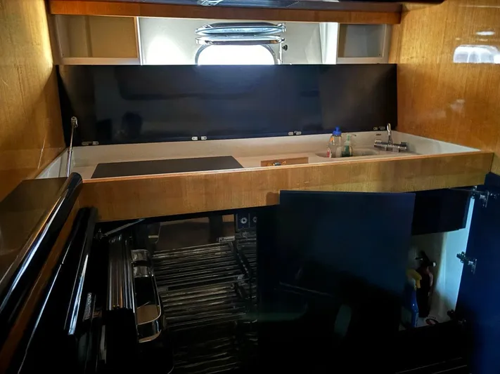  Yacht Photos Pics Interior of 1998 Cantieri di Sarnico MAXIM 55 SPECIAL yacht kitchen area.