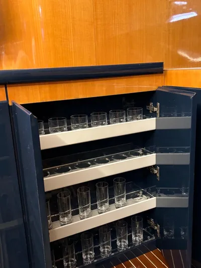  Yacht Photos Pics Glassware storage in 1998 Cantieri di Sarnico MAXIM 55 SPECIAL yacht interior.