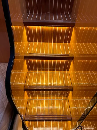  Yacht Photos Pics Illuminated wooden stairs on a 1998 Cantieri di Sarnico MAXIM 55 SPECIAL yacht.