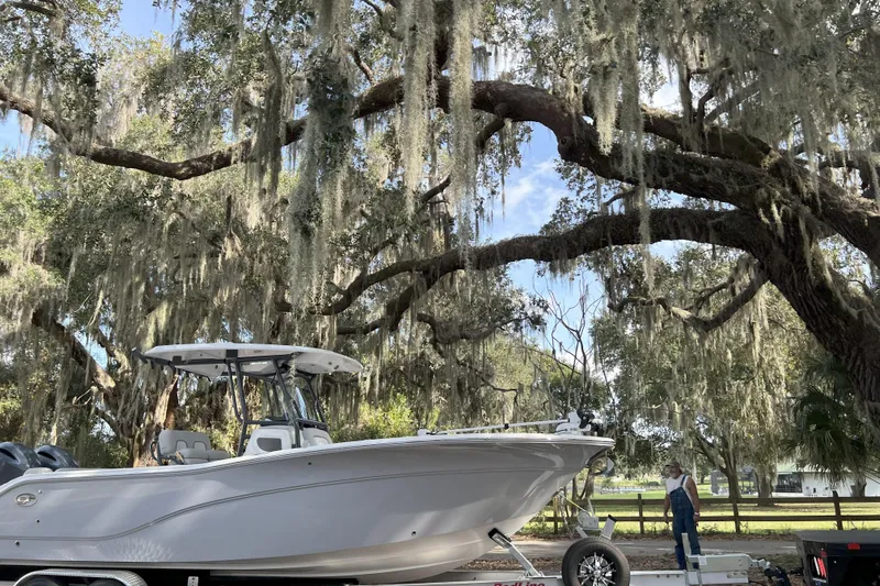 Your Next Boat! Yacht Photos Pics 2023 Sea Fox 268 Commander boat under large oak tree with Spanish moss.