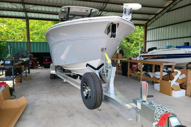 Your Next Boat! Yacht Photos Pics 2023 Sea Fox 268 Commander boat on trailer in a covered storage area.