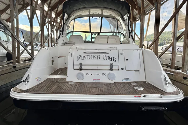 Finding Time Yacht Photos Pics 2011 Sea Ray 350 Sundancer docked, rear view with "Finding Time" name, Vancouver, BC.