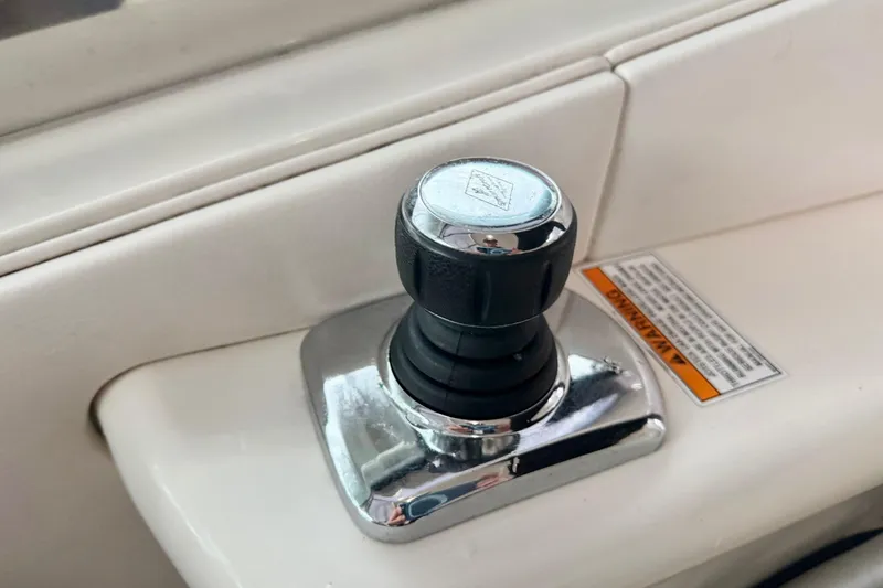 Finding Time Yacht Photos Pics Joystick control on 2011 Sea Ray 350 Sundancer boat dashboard.