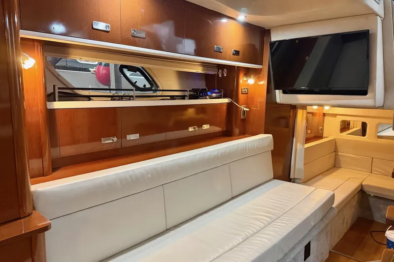 Finding Time Yacht Photos Pics Interior of 2011 Sea Ray 350 Sundancer yacht with luxurious seating and modern amenities.