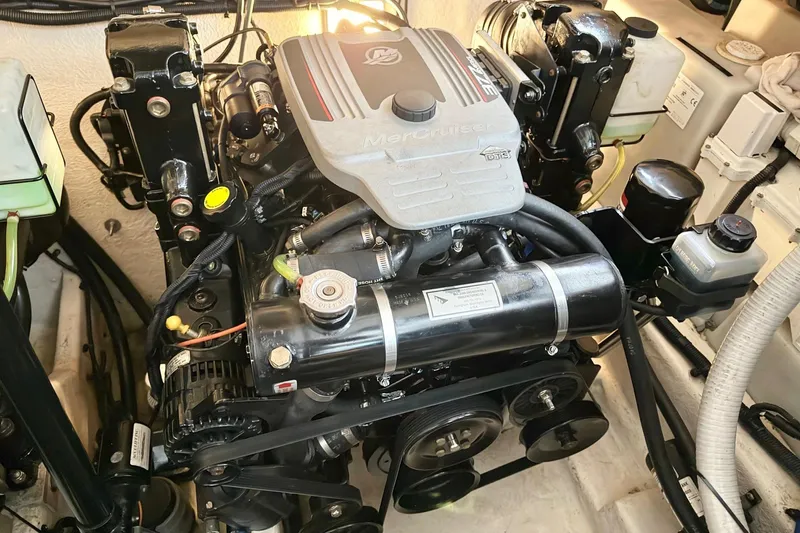 Finding Time Yacht Photos Pics Engine compartment of a 2011 Sea Ray 350 Sundancer boat, featuring a MerCruiser engine.