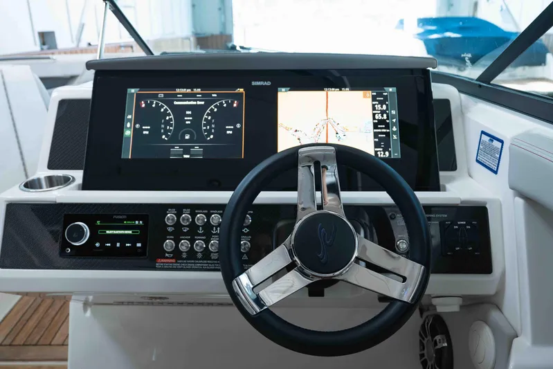  Yacht Photos Pics 2021 Sea Ray SLX 350 helm with advanced navigation and control systems.