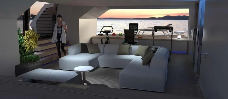  Yacht Photos Pics Luxurious yacht interior with modern furniture, exercise equipment, and ocean view at sunset, TUREDDI ERA 45.