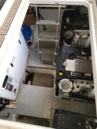  Yacht Photos Pics Engine room of a 2009 Marquis SC yacht with visible machinery and equipment.