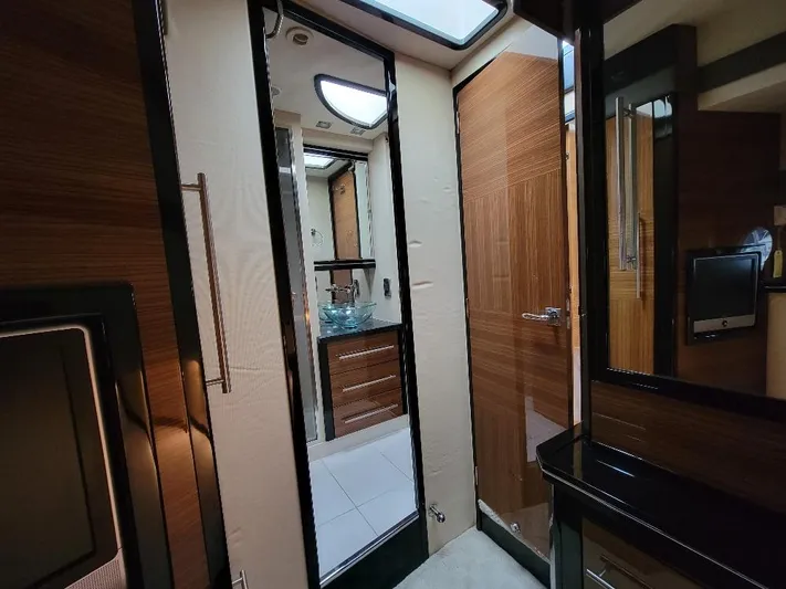  Yacht Photos Pics Luxurious interior of a 2009 Marquis SC yacht featuring modern wood finishes and sleek design.