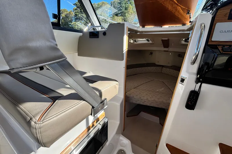  Yacht Photos Pics 2024 Cutwater C-248 Coupe interior with seating and cabin view.