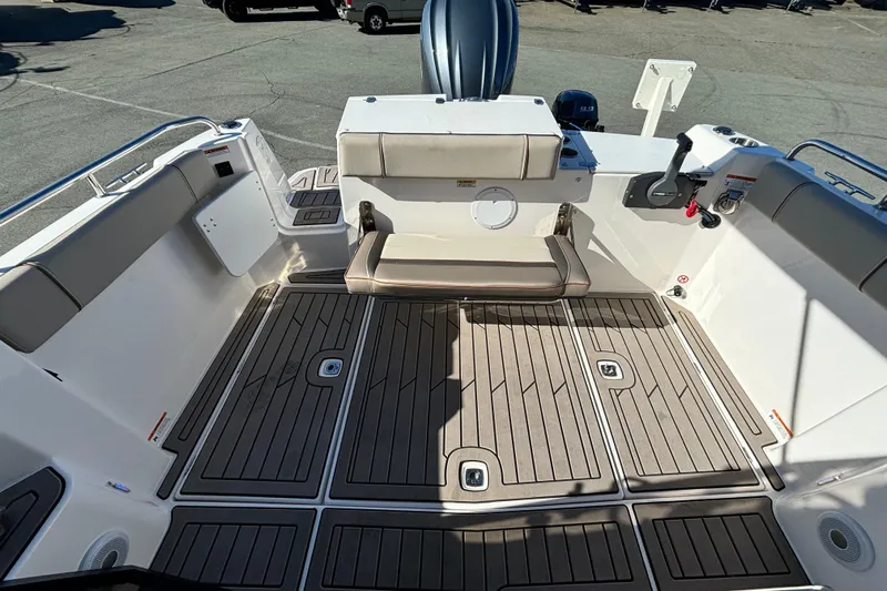  Yacht Photos Pics 2024 Cutwater C-248 Coupe boat deck with seating and modern design features.