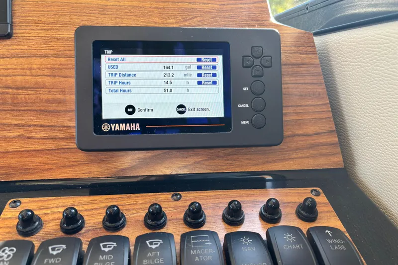  Yacht Photos Pics Yamaha control panel on 2024 Cutwater C-248 Coupe boat dashboard, displaying trip data.