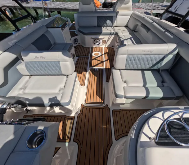 2016 Sea Ray 290 Sundeck @ Cancun Yacht Photos Pics 2016 Sea Ray 290 Sundeck interior with luxurious seating and teak flooring.