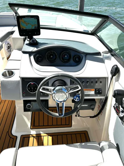 2016 Sea Ray 290 Sundeck @ Cancun Yacht Photos Pics 2016 Sea Ray 290 Sundeck helm with steering wheel, gauges, and navigation system.