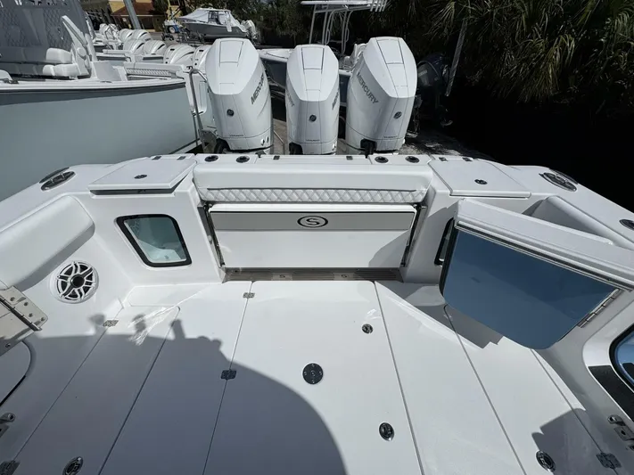  Yacht Photos Pics 2025 Sportsman 352 Open boat deck with triple Mercury engines.