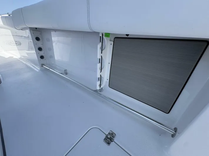  Yacht Photos Pics 2025 Sportsman 352 Open boat interior with sleek storage compartment and modern design.