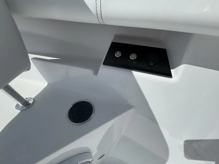  Yacht Photos Pics 2025 Sportsman 352 Open boat interior detail with control panel and seating.