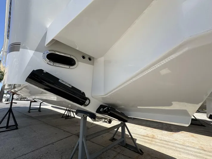  Yacht Photos Pics 2025 Regulator 35cc boat hull on stands, showcasing sleek design and craftsmanship.