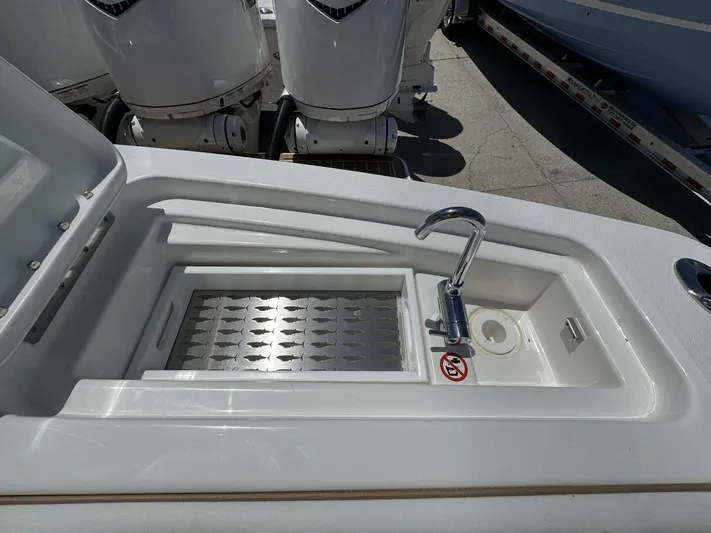  Yacht Photos Pics 2025 Regulator 35cc boat sink with faucet and storage compartment.