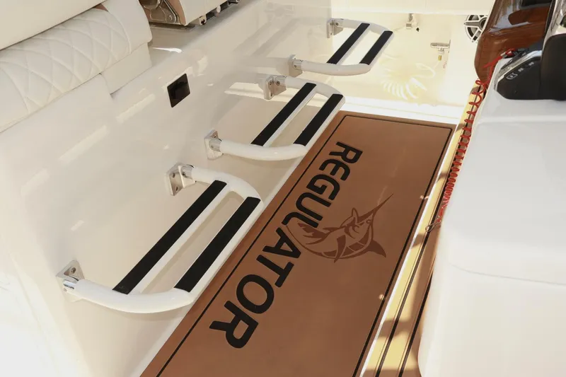  Yacht Photos Pics 2025 Regulator 35cc boat interior with branded flooring and seating.