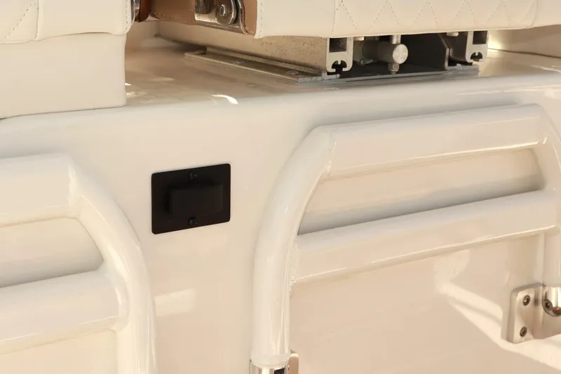  Yacht Photos Pics 2025 Regulator 35cc boat interior detail with white seating and sleek design.