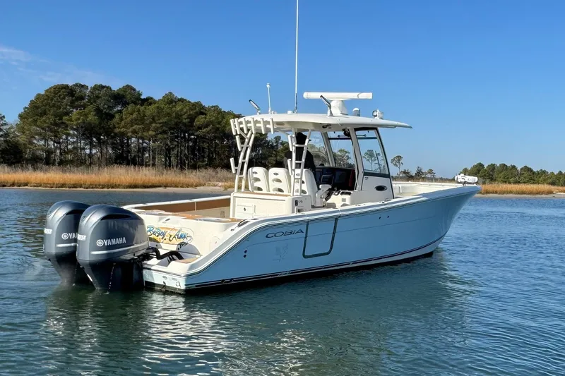 Betsey Ann Yacht Photos Pics 2015 Cobia 344 Center Console boat with twin Yamaha engines on calm water.