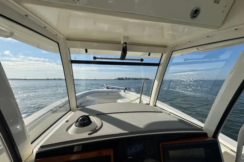 Betsey Ann Yacht Photos Pics 2015 Cobia 344 Center Console boat interior view with ocean horizon.