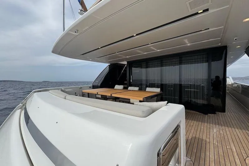  Yacht Photos Pics Luxurious 2024 Sanlorenzo SL90A yacht deck with elegant seating and ocean view.