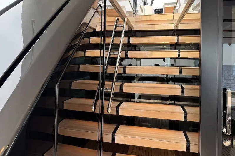 Yacht Photos Pics Staircase on 2024 Sanlorenzo SL90A yacht, featuring sleek wooden steps and modern design.