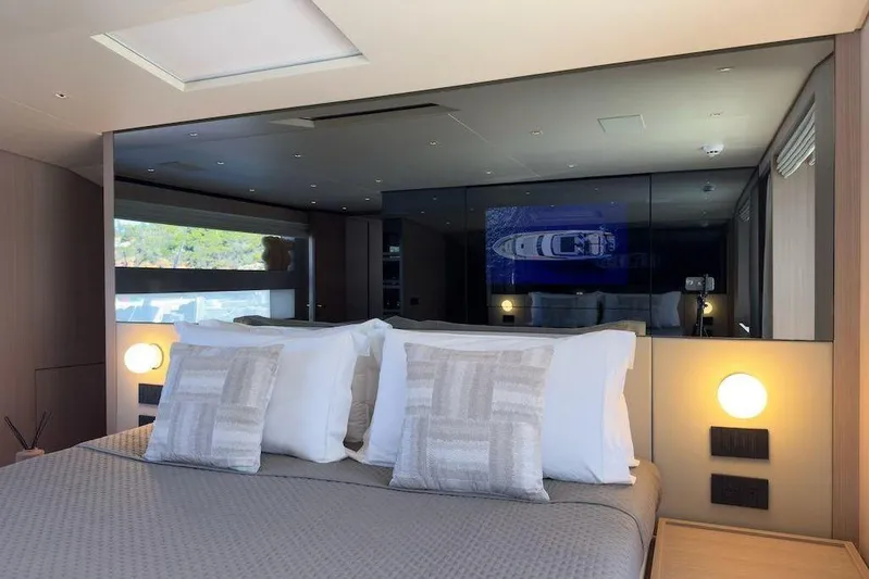  Yacht Photos Pics Luxurious bedroom interior of 2024 Sanlorenzo SL90A yacht with modern design elements.