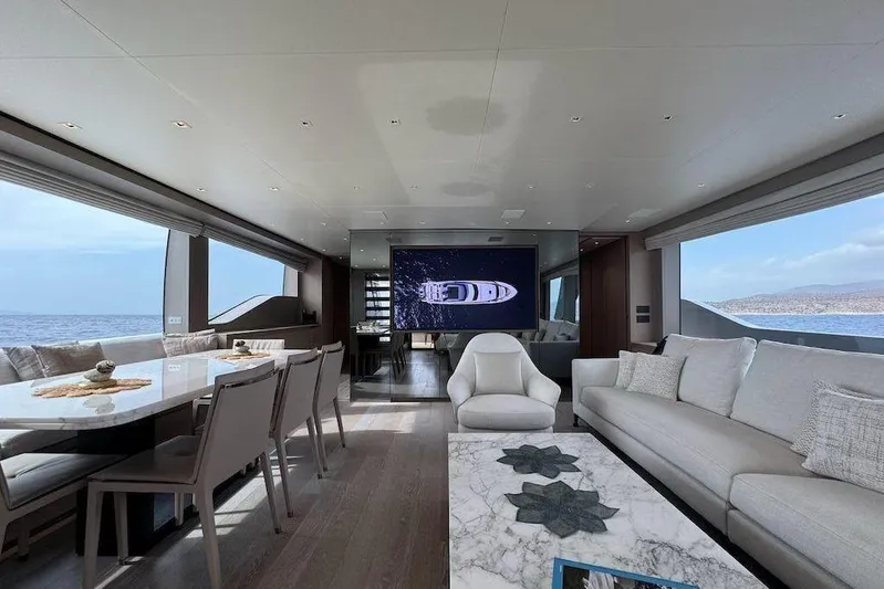  Yacht Photos Pics Luxurious interior of 2024 Sanlorenzo SL90A yacht with elegant seating and ocean view.